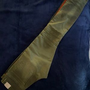 Green and red embellish pants with red stripe down the side good condition